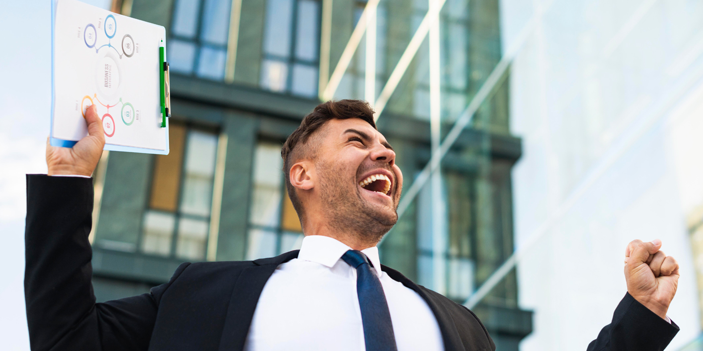 young-business-man-being-happy-low-view